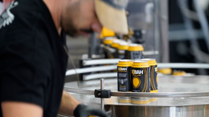 Photo of cans of Sobah on the canning line.